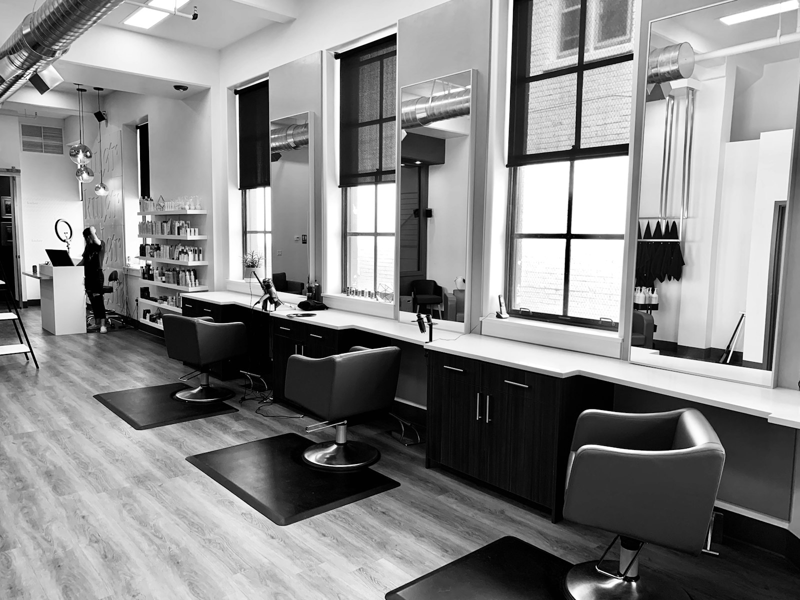 Stylish women's hair salon interior with warm lighting